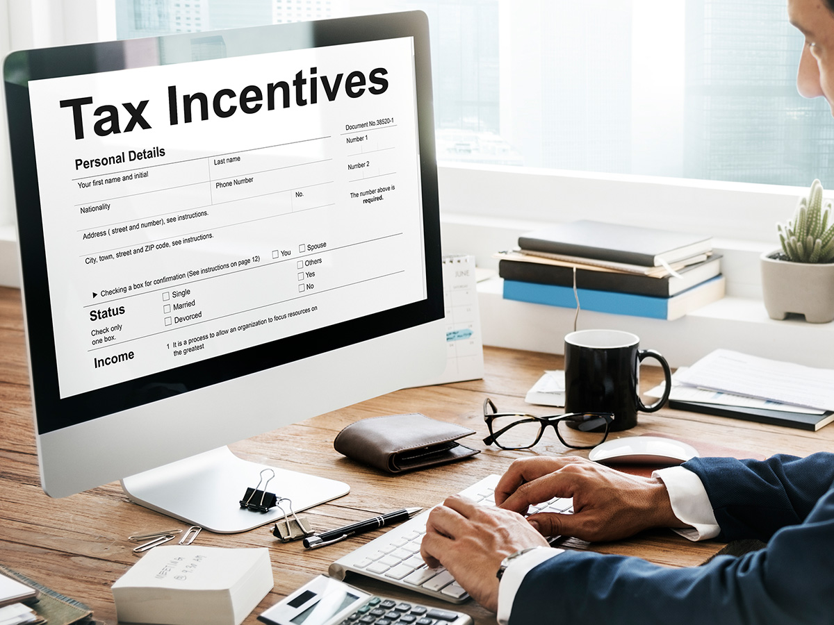 Image of someone looking at tax incentives