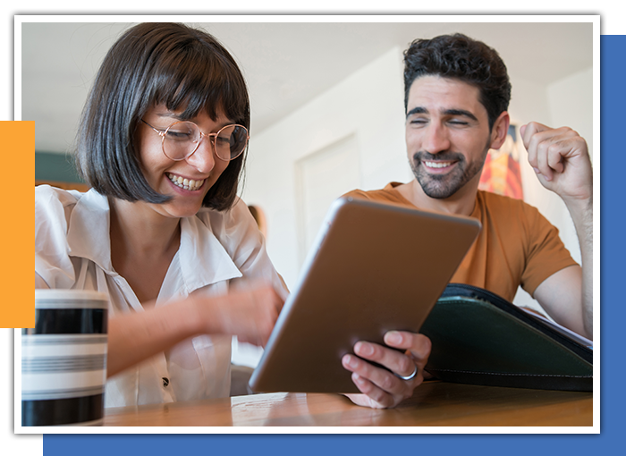 Image of a couple looking at a bill