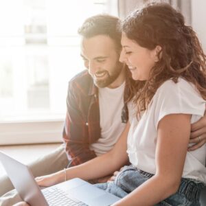 Couple using a laptop