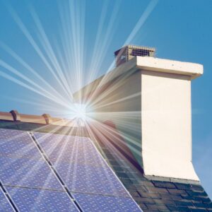 solar panels on a roof with a sun glint