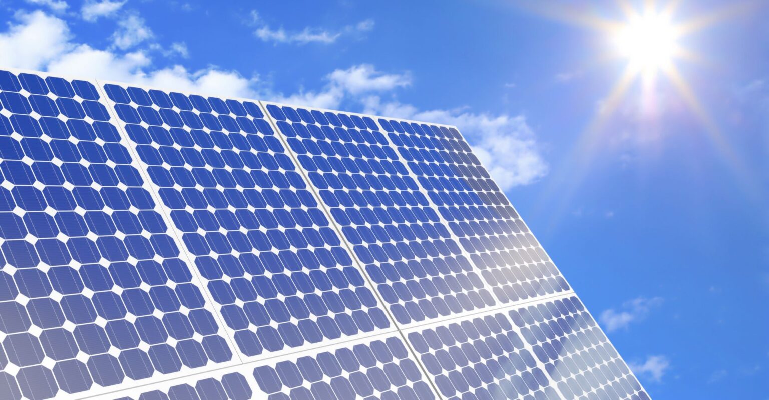 a solar panel with bright sunshine