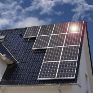 solar panels on a house roof in the sunlight