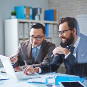 business people discussing paperwork