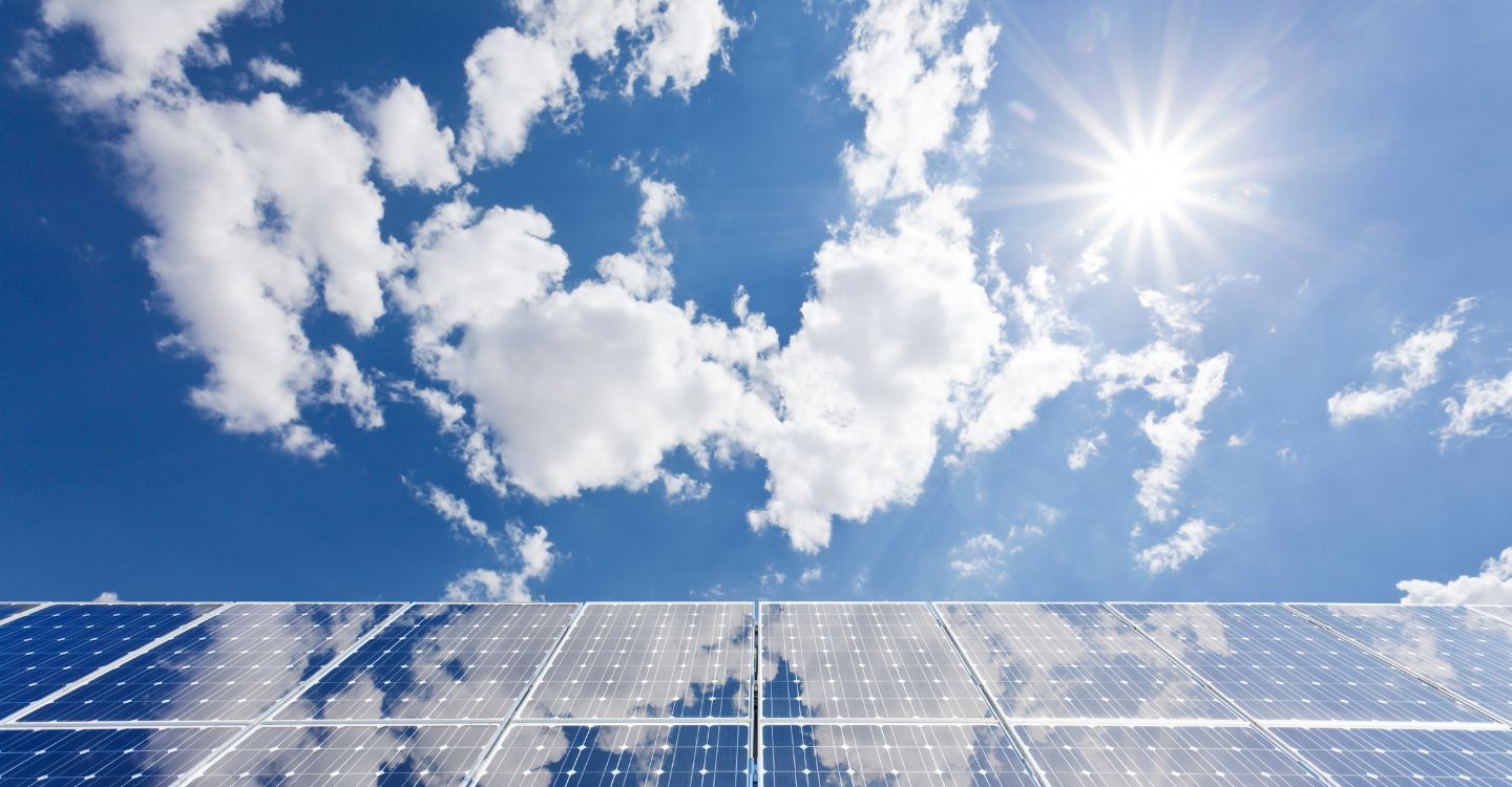 solar panels under a blue sky