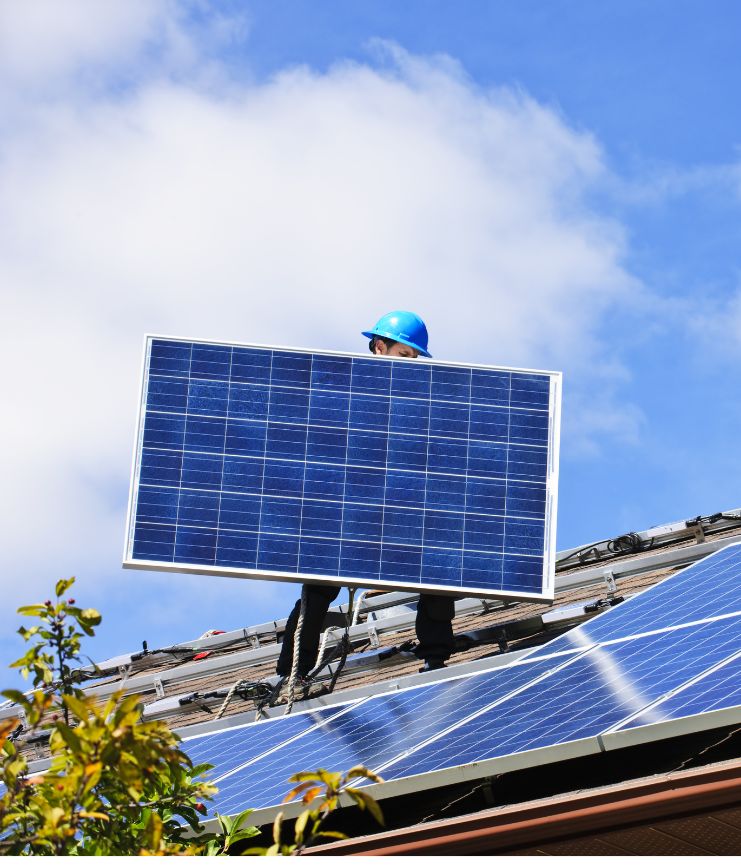 man holding large panel