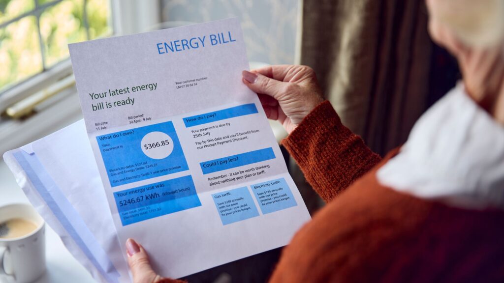 person holding an energy bill