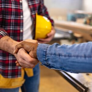 handshake between contractor and client
