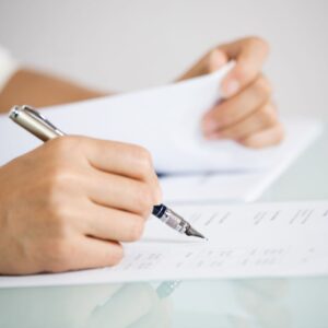 person reviewing paperwork