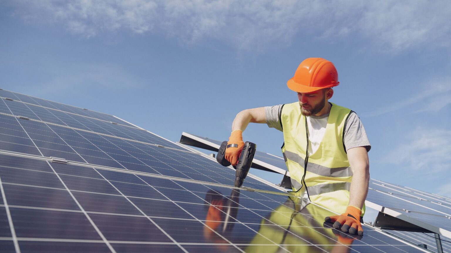 Man working on a solar panel