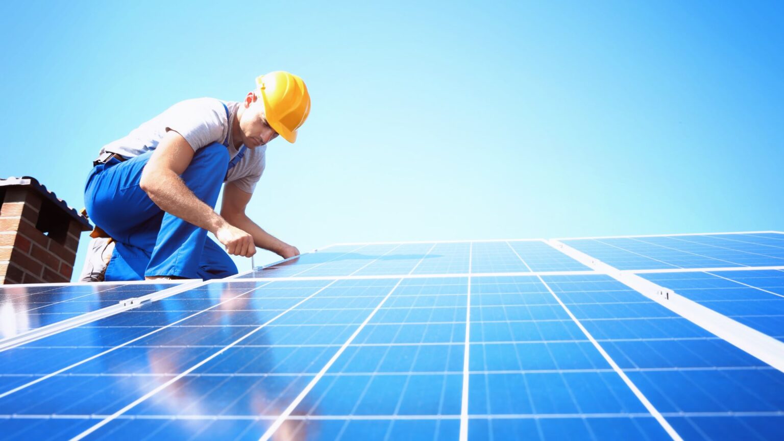 technician working on solar panels