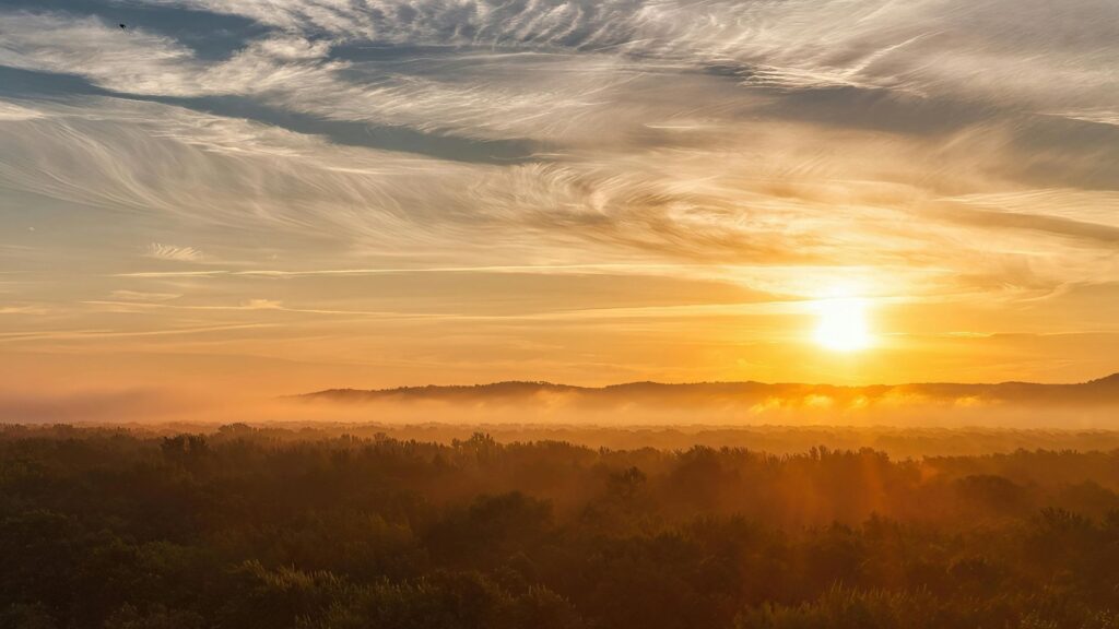 sun over valley