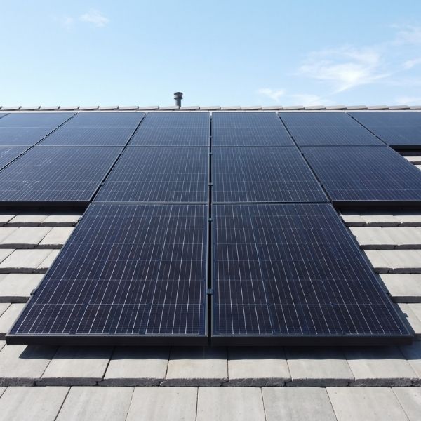 Professionally installed rooftop solar panel array on a California home.