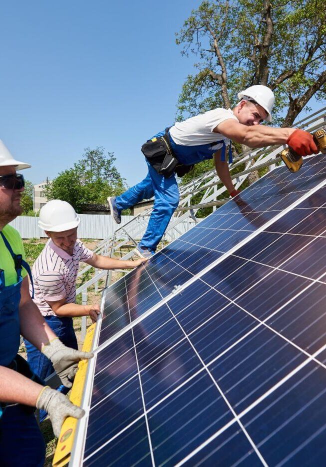 people installing solar panel